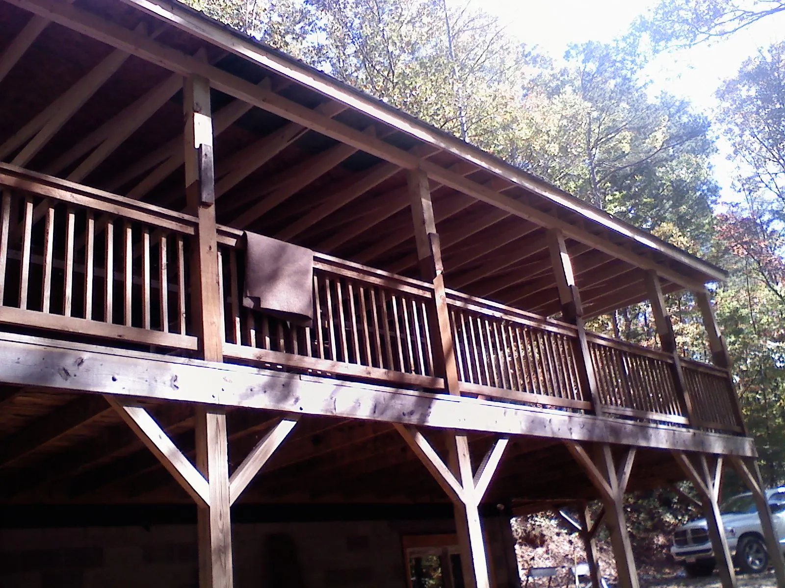 Timber framing under a new elevated porch and deck — Roof Leak Repair in Hampton Falls by Roofing Brothers